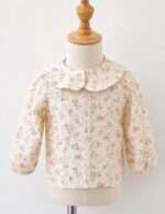 Blusa cuello bebé setas