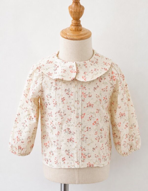 Blusa cuello bebé setas