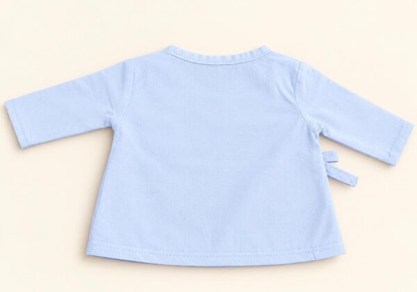 Blusa cruzada celeste